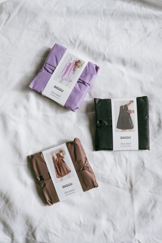 Baggu reusable bags in various colours: lilac, brown, black