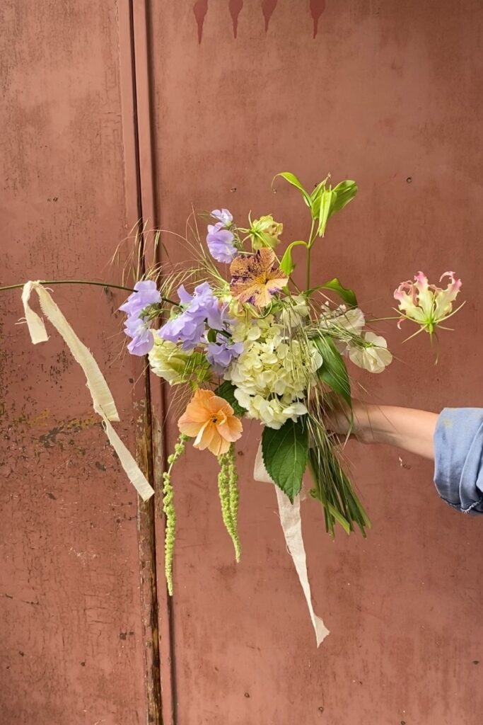 Early summer wedding bouquet by Wilder with hydrangea, lathyrus and paper flowers, May 22