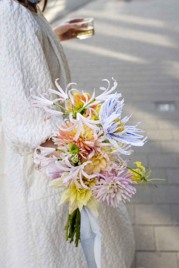 Wedding bouquet with seasonal summer flowers and handmade paper flower by Wilder Antwerp