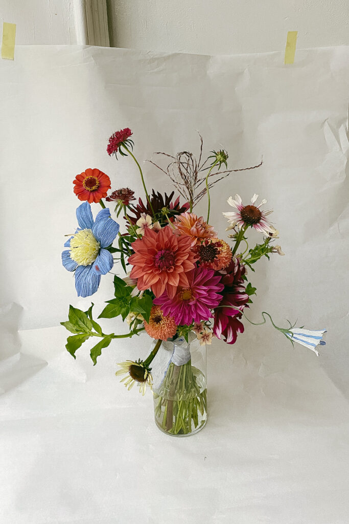 Wedding bouquet with seasonal summer flowers and handmade paper flower by Wilder Antwerp
