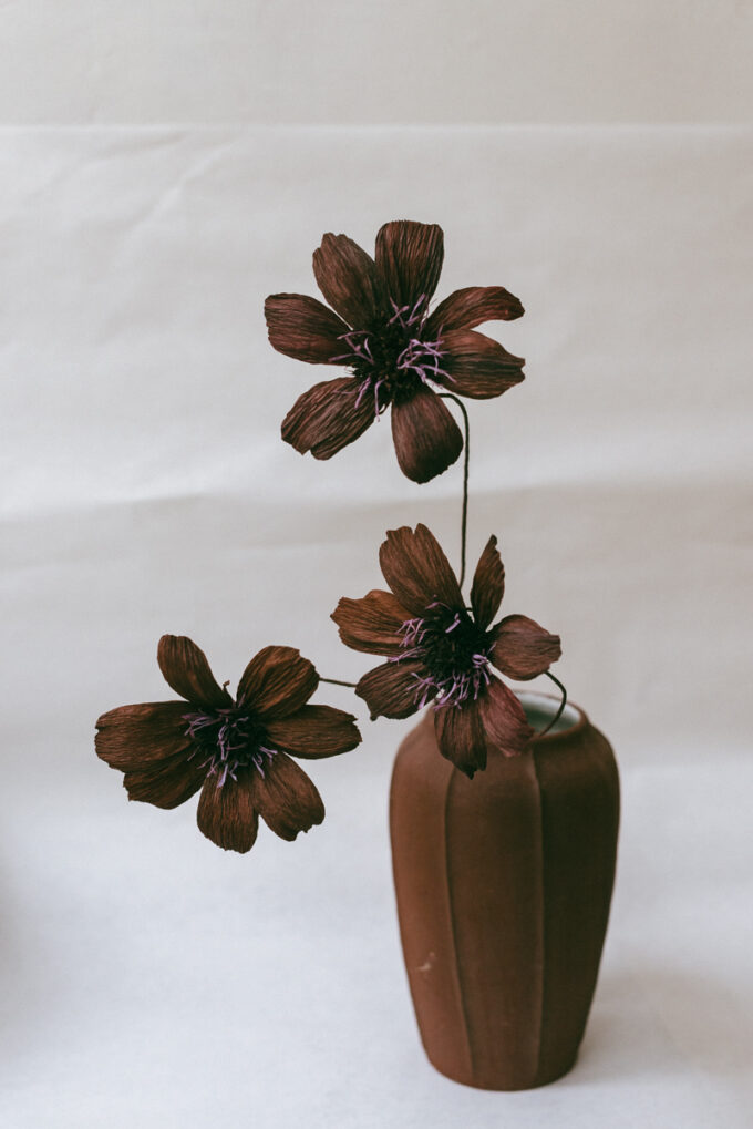 Vintage brown ribbed ceramic vase with handmade chocolate brown paper flowers at Wilder Antwerp
